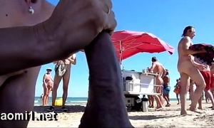 Suck a large weenie on a public beach